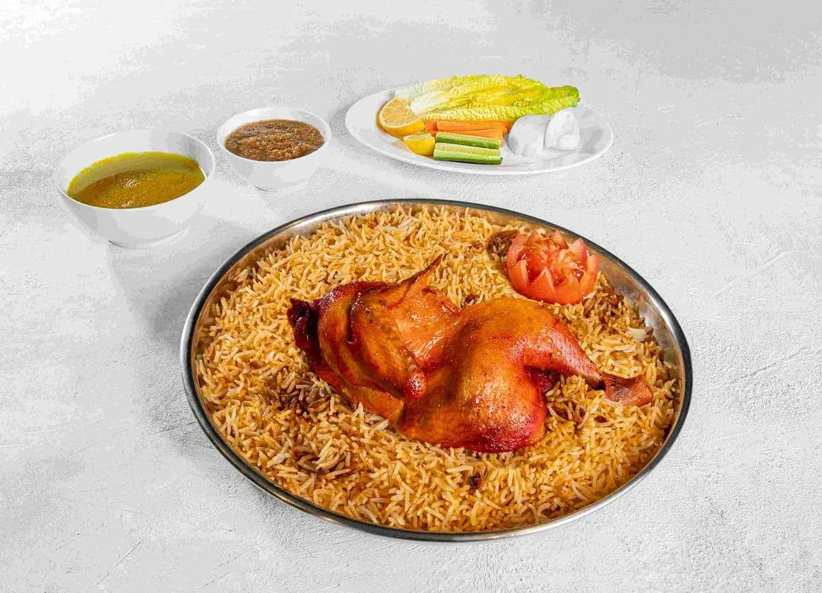 Whole roasted chicken Mandi at Maraheb
