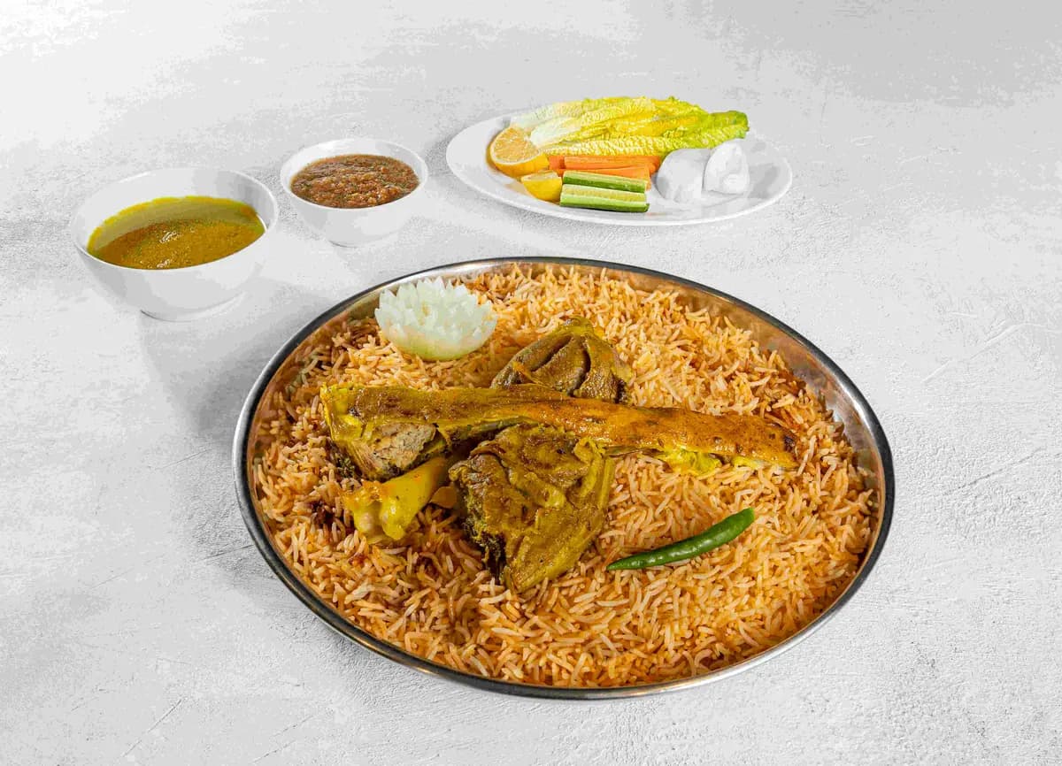 Chicken Mandi served over Yemeni rice at Maraheb