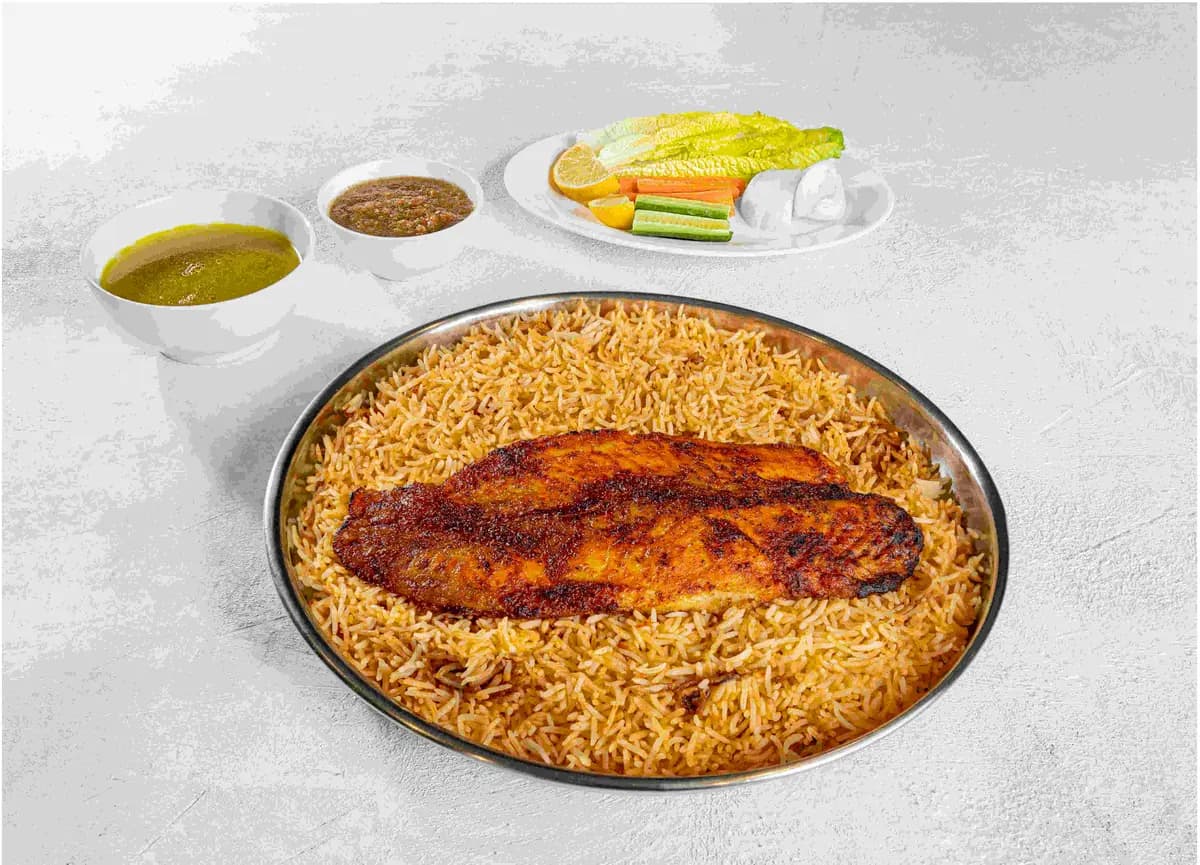 Lamb Mandi served over golden Mandi rice at Maraheb