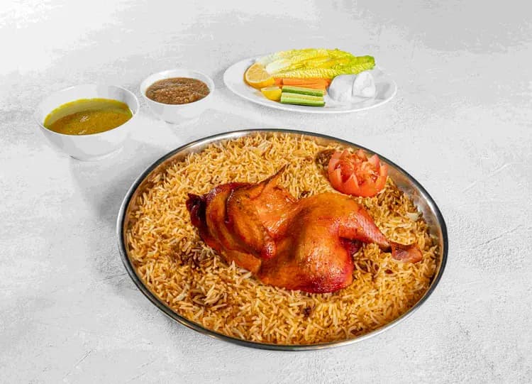 Yemeni Mandi prepared using traditional slow-cooking methods at Maraheb