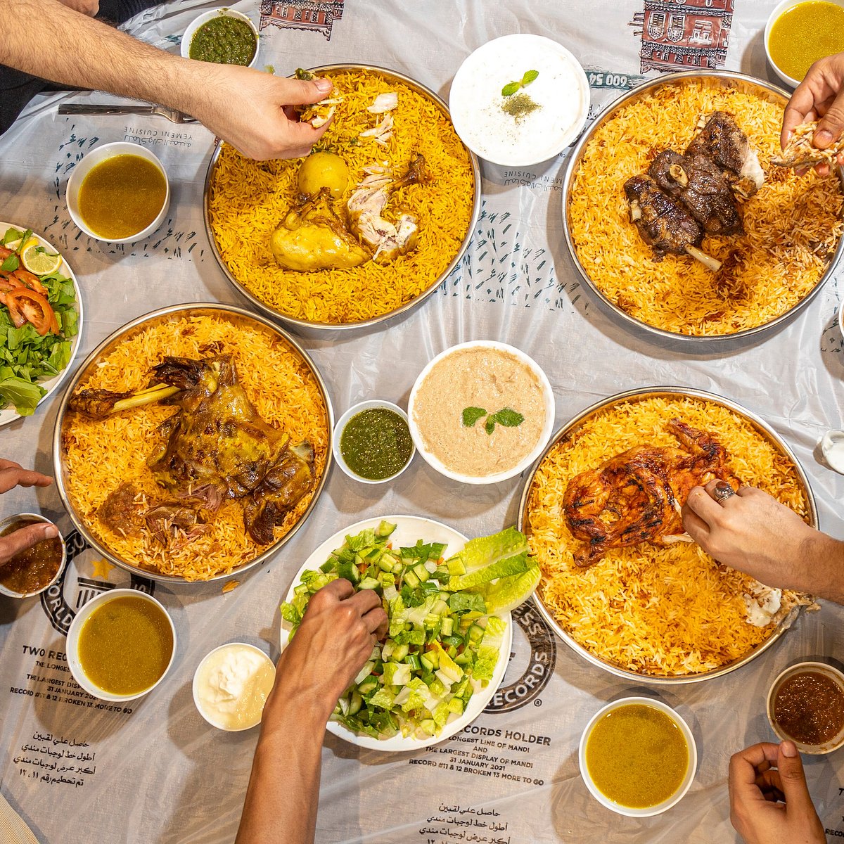 Family-size mandi platter for group dining at Maraheb Dubai